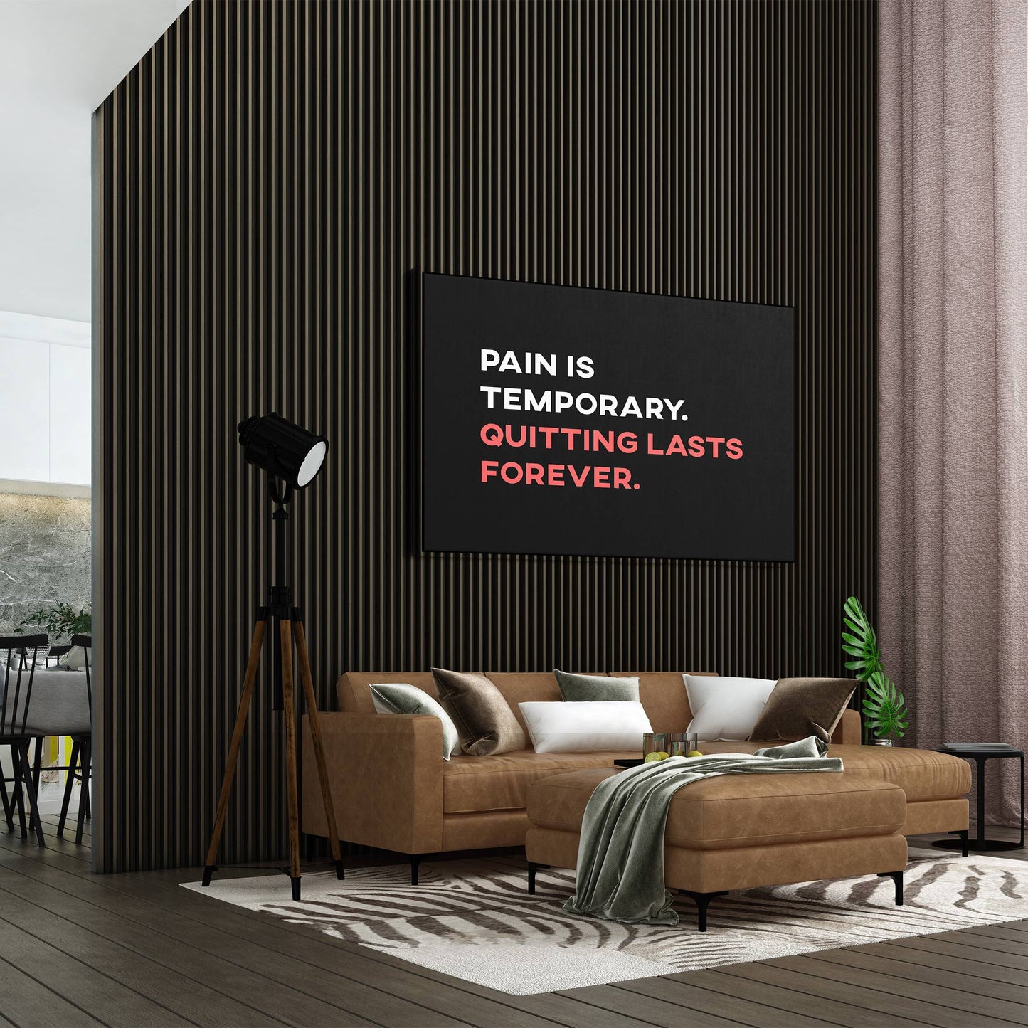 Pain is Temporary hanging on wall above couch